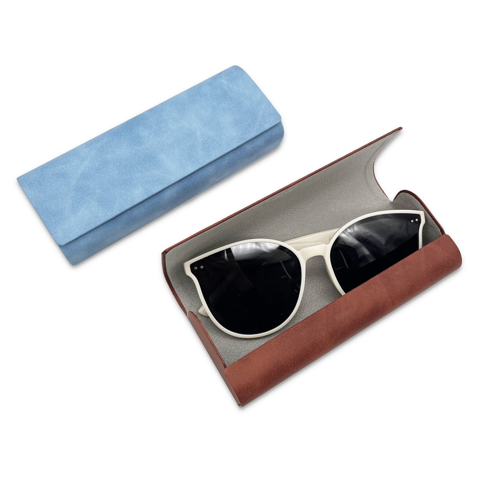 Open reddish-brown foldable glasses case with sunglasses beside a closed blue case.
