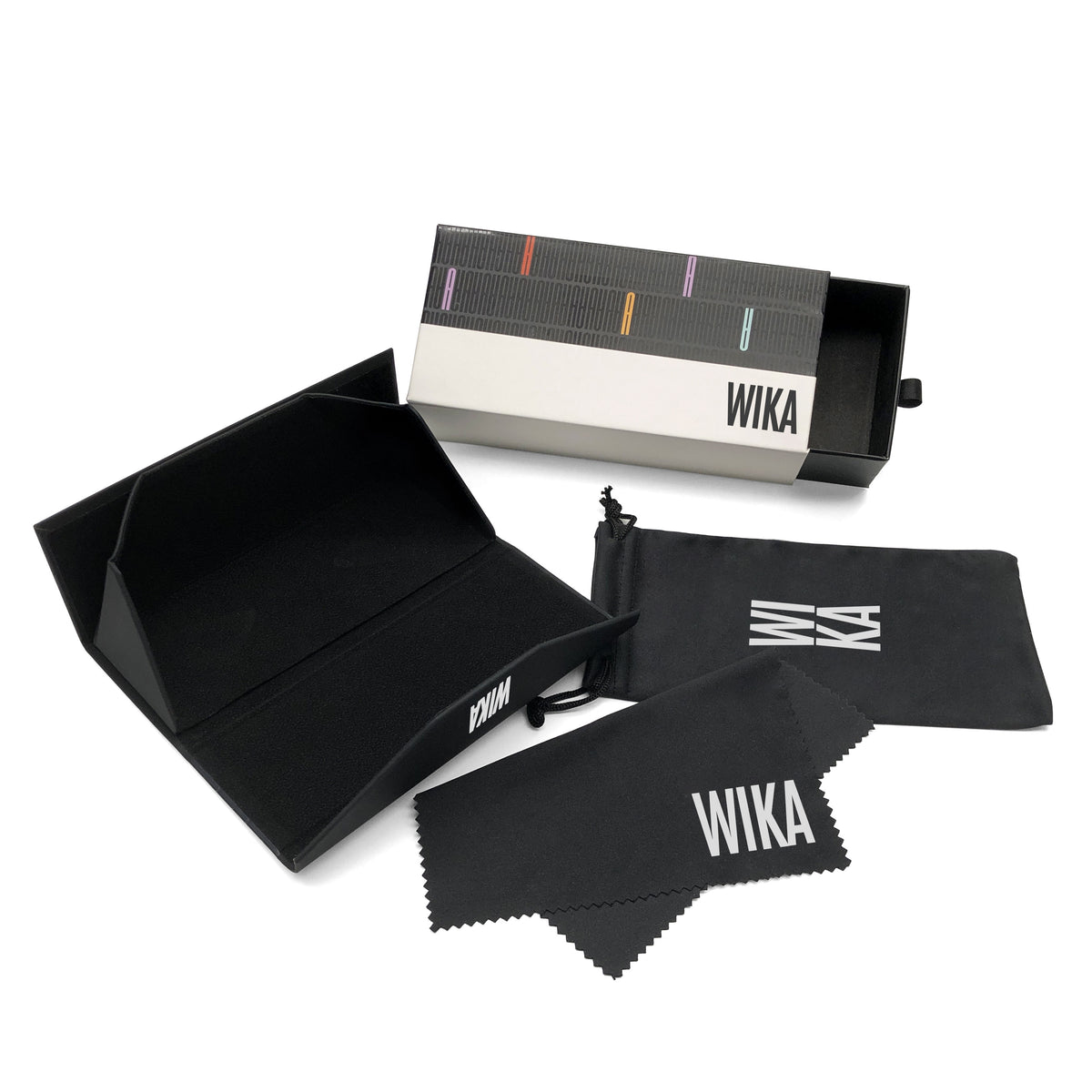 Open graphic flap case beside printed drawer box