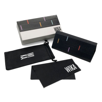 Graphic case and printed box beside pouch and cloth